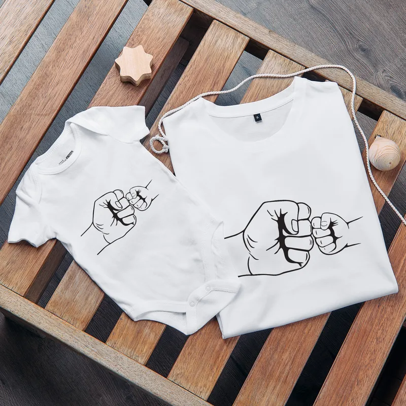 Black T-shirt Baby Body Combination with Fist Salute Design