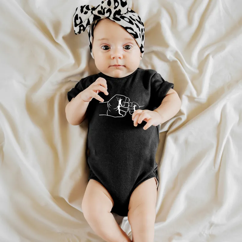 Black T-shirt Baby Body Combination with Fist Salute Design