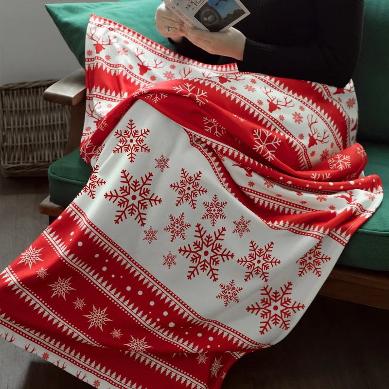Festive Red Snowflake TV Blanket for Cosy Winter Evenings
