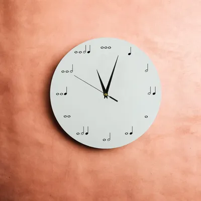 Music Lover's Wall Clock with Elegant Note Design for Home Decor