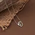 Mother and Child Footprint Design Silver Necklace with Zircon Stone
