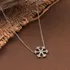 Stony Snowflake Silver Necklace
