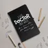 Wise Doctor Motto Black Notebook